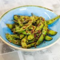 Edamame Chili Garlic · Tender soybean pods served with sea salt and sesame oil | Available Gluten Friendly | Availa...