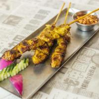 Street Skewers - Satay Chicken · three per order, dark meat chicken brushed with satay sauce and cooked over 1000° wood burni...