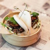 Roast Duck Bao · Five-spice hand-pulled duck and crispy. skin with housemade black vinegar hoisin,. cucumbers...