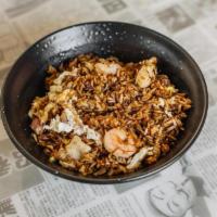Chow Faan · Classic fried rice packed with. chicken, shrimp, char siu, eggs,. onions, and soy sauce.