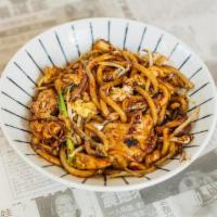 Yaki Udon · Thick udon noodles with sliced chicken, eggs, onions, bean sprouts, green onions, carrots, w...