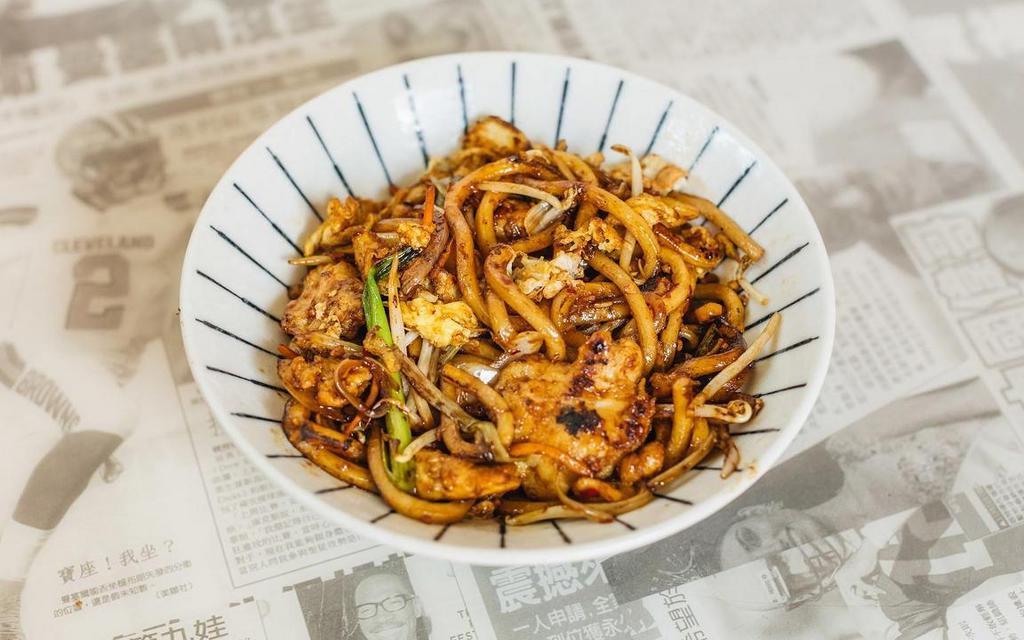 Yaki Udon · Thick udon noodles with sliced chicken, eggs, onions, bean sprouts, green onions, carrots, wok-fired in a savory sauce with a chili finish | Some Heat | Available Veggie Friendly
