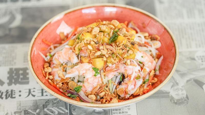 Green Papaya & Shrimp · crisp papaya and poached shrimp, carrots, basil, cilantro, fried shallots, roasted peanuts, served with our Vietnamese vinaigrette (contains fish sauce) | Available Gluten Friendly | Available Veggie Friendly