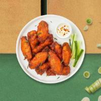 Chicken Wings · Fresh chicken wings breaded and fried until golden brown and tossed in your choice of sauce....