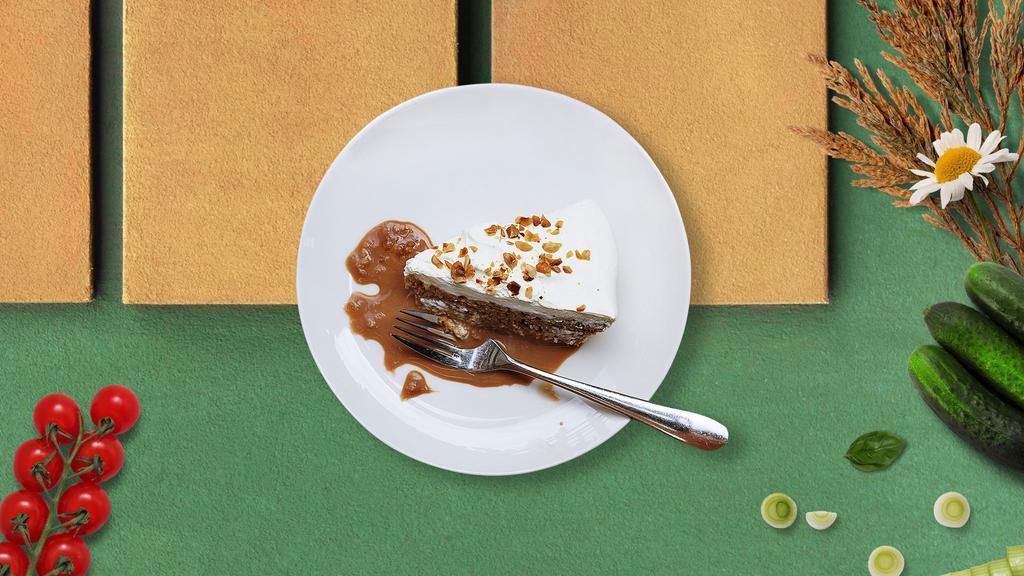 Turtle Battle Cheesecake · An ultra-rich cheesecake topped with caramel, chocolate and pecans.