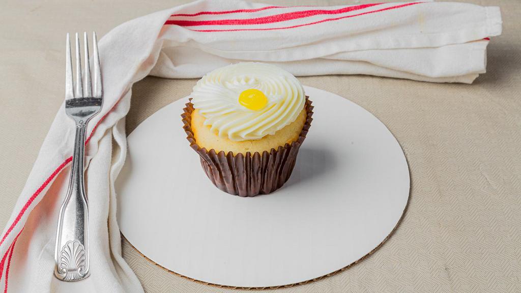 Lemon Drop · Vanilla cake filled with tangy lemon topped with lemon buttercream and lemon dollop.
