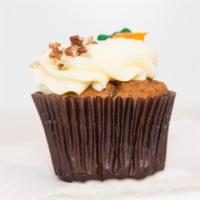 Carrot Cake · Traditional carrot cake with coconut and pecans baked in and a dollop of cream cheese frosti...