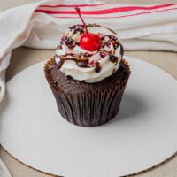 Hot Fudge Sundae · Chocolate cake with buttercream frosting, roasted pecans, hot fudge and cherry.
