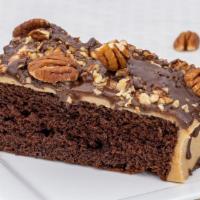 Chocolate Turtle · Delectable chocolate cake, topped with Coco's celebrated caramel icing, pecans & chocolate d...