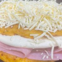 Cachapa Ham & Cheese · Tender corn with cheese and ham.