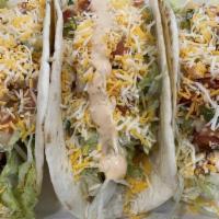 Chicken Tacos (3 Pcs) · Chicken, pico de gallo, guacamole, lettuce, Mexican cheese, and flour tortilla.