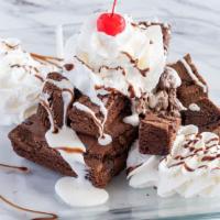 Brownie Sundae · Includes two scoops of ice cream, one wet topping, whipped cream, nuts or sprinkles and a ch...