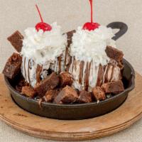 Brownie Cookie Skillet · Large Brownie and chocolate chip cookie warm skillet, Includes 2  scoop of ice cream,  wet t...