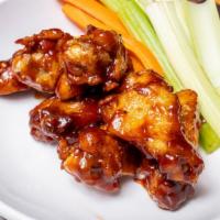 Chicken Wings (8) · Marinated & Roasted, Signature Buffalo or Kansas City
Style BBQ Sauce, Carrots, Celery, Blue...