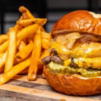 Social Smash Burger · Two 1/4 lb. Smashed Patties, American Cheese, Smash Sauce, Pickles, Caramelized Onions, Pret...