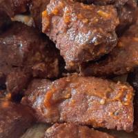 Pork Shoulder Burnt Ends Half Pound · Cubed pieces of Pork Shoulder, slow smoked and smothered in Harvey's Original BBQ Sauce. Per...