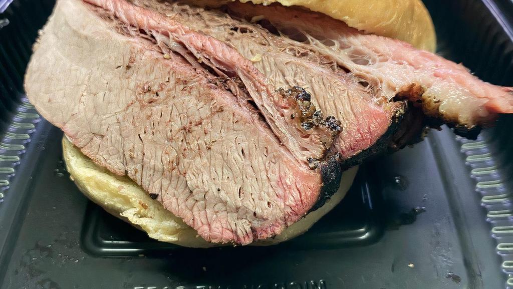 Beef Brisket Sandwich Sandwich · Served with (1) choice side, No substitutions. Additional side items can be added under A La Carte Side Section.