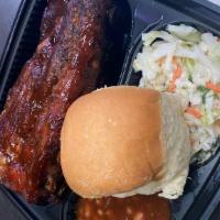 Baby Back Ribs Plate  · Served with CHOICE of (2) sides and CornBread. Additional side items can be added under A La...