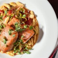 Faroe Island Salmon Medallion · Noilly Prat Sauce with Leeks, Tomatoes, and Herb Butter. Tossed with Cavatelli Pasta.