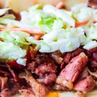 D'Miami Beach · Pastrami, Swiss cheese, coleslaw, Russian dressing.