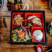 Bento Box · All bento boxes come with salad/ginger dressing, 3 pork gyoza, rice and choice of protein