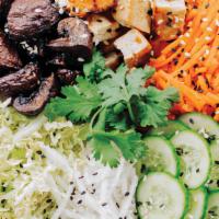 Seoul Bowl (Vegan) · brown rice, spinach, tofu, roasted mushrooms, cucumber, daikon radish, napa cabbage, carrot,...