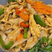 Drunken Noodle · Stir fried spicy flat noodle with carrots, green bean, bell pepper, onion and basil