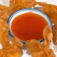 Crab Rangoon · Crispy wonton stuffed with imitation crab meat and cream cheese served with Thai Sweet Chili...