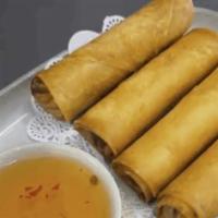 Veggie Spring Roll · Crispy vegetarian roll, deep friend, served with sweet and sour sauce.