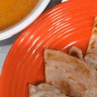 Roti · Choice of green, red or yellow curry dipping sauce.