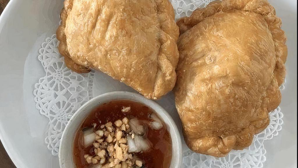 Chicken Curry Puffs · Minced chicken with potato, carrots, onion and curry powder, wrapped in a fresh puff pastry.