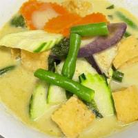Green Curry · Green chili paste in coconut milk with eggplant, zucchini, string bean and carrots