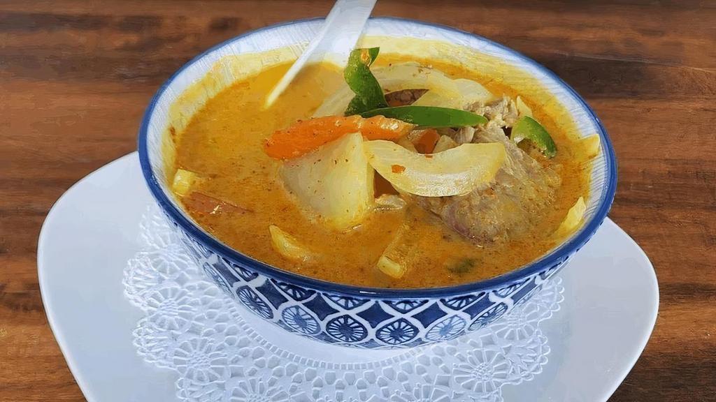 Yellow Curry · Yellow chili paste in coconut milk with onion, bell pepper, potatoes and carrot