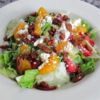 Baby Blue Salad · Mixed greens topped with blue cheese crumbles, Mandarin oranges, strawberries, and candied p...