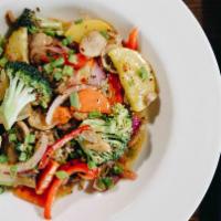 Vegetable Stir Fry · Crisp broccoli florets, carrots, squash, onions, peppers, mushrooms, and zucchini tossed in ...