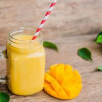 Mango Madness · Deliciously ripe, sweet and tangy mango smoothie blended with orange juice, pineapples, yogu...