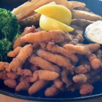 Clam Strip Platter · A Hearty pile of our fried clam strips, served with 2 sides, and tangy tartar sauce for dipp...