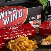 The Wing Party In A Box · The Wing Party in a Box - 50 Wings, Fried Cheese, Hot Shots, Buffalo or Spinach Dip, and 2 L...