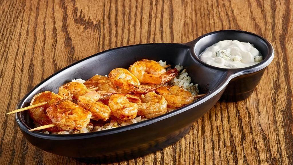 Buffalo Shrimp · Ten Fried or Grilled shrimp tossed in our hot sauce and served with bleu cheese and celery..
