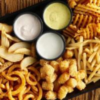Frycouterie · A Huge Platter of our Big Fat Fries, Coated Waffle Fries, Shoestrings, Curly Fries, and Tots...