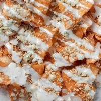 Buff Chips · Topped with bleu cheese crumbles and southwest ranch for dipping. Or Make 'em Saucy! Tossed ...