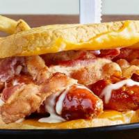 Honey Bbq Chicken Toasty · Hand-Breaded Chicken Tenders, bathed in homemade Honey BBQ Sauce, Cheddar Cheese, Bacon and ...