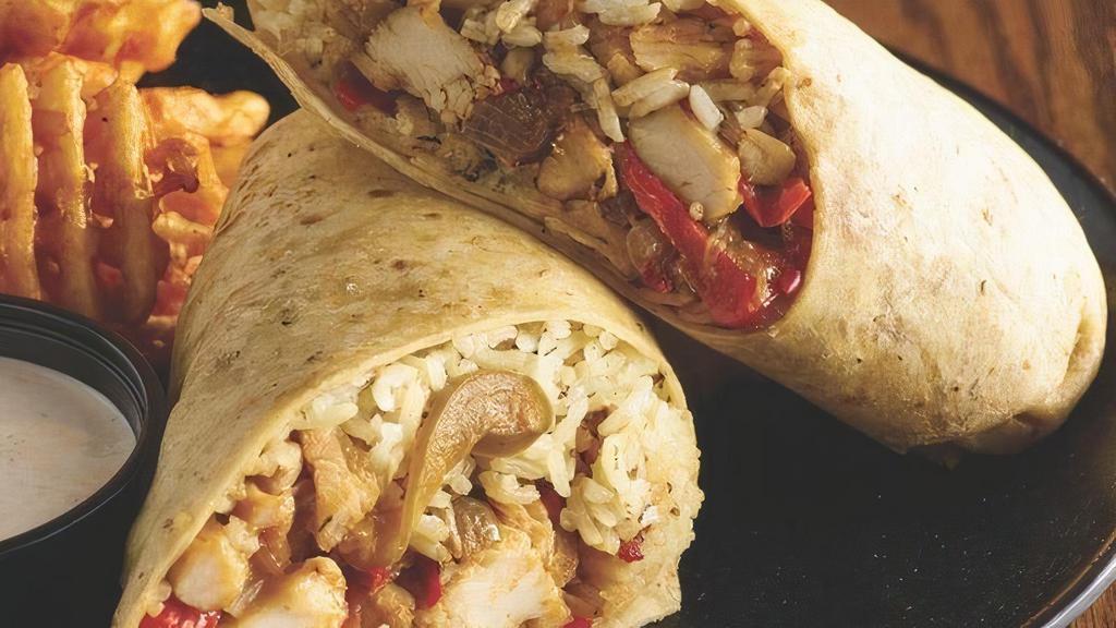 Fajita Fiesta Wrap · Grilled Fajita chicken, caramelized onions, roasted peppers, fiesta rice and monterey jack cheese wrapped in a garlic herb tortilla. Served with southwest ranch for dipping..