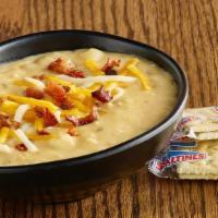 Bowl Of Loaded Potato Soup · Our rich and creamy potato soup topped with mixed cheese and crumbled bacon..