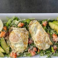 Lynn'S Breakfast Salad Egg Platter · 2 cage-free eggs over medium, 1/2 avocado, arugula & tomatoes tossed with tangy lemon dressi...