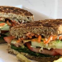Very Vegan Sandwich · hummus, spinach, cucumbers, carrots, tomatoes, avocado & sunflower seeds on toasted multi-gr...