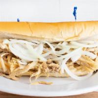Pan Con Lechon · Mayo, cooked and shredded pork and cooked onions.