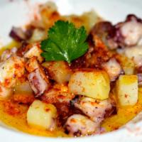 Pulpo A La Parrilla Pequeño · Boiled Galician baby octopus served with boiled potatoes, olive oil, sea salt and Pimentón d...