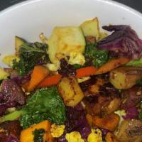 Cauli Tempe Bowl · Cauliflower and chickpea Tempeh with sweet potato hash and veggies.