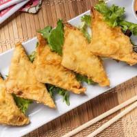 Crispy Crab Wontons · Stuffed with krabmeat and cream. cheese filling, studded with green. onion and jalapeño, and...